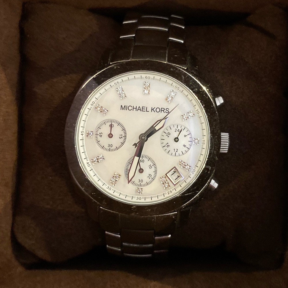 Michael Kors watch. Silver with opalized face.